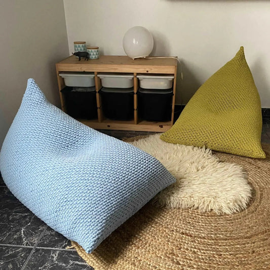 light blue knitted bean bag in a modern kids room