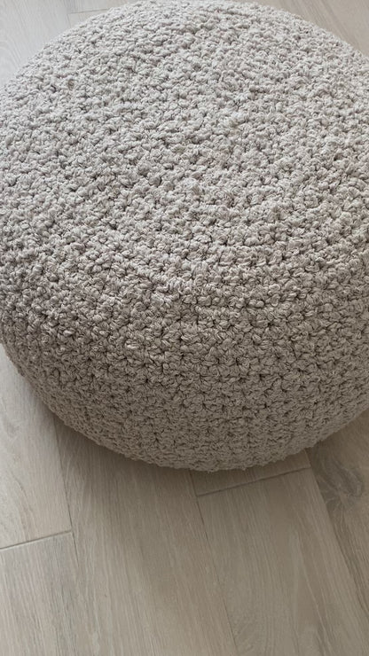 video of boucle ottoman pouf knitted by looping home